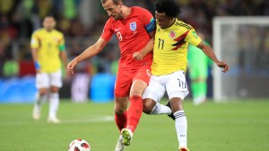 England's Harry Kane (right) and Colombia's Juan Cuadrado