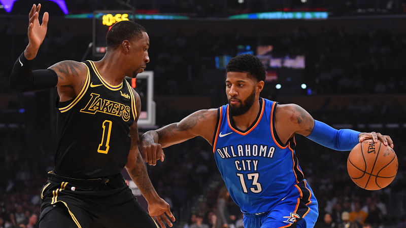 Los Angeles Lakers guard Kentavious Caldwell-Pope and Oklahoma City Thunder forward Paul George
